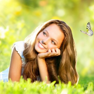 happy-woman-butterfly-nature